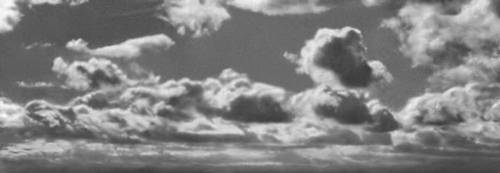 Фотографический снимок с негатива, содержащего облака